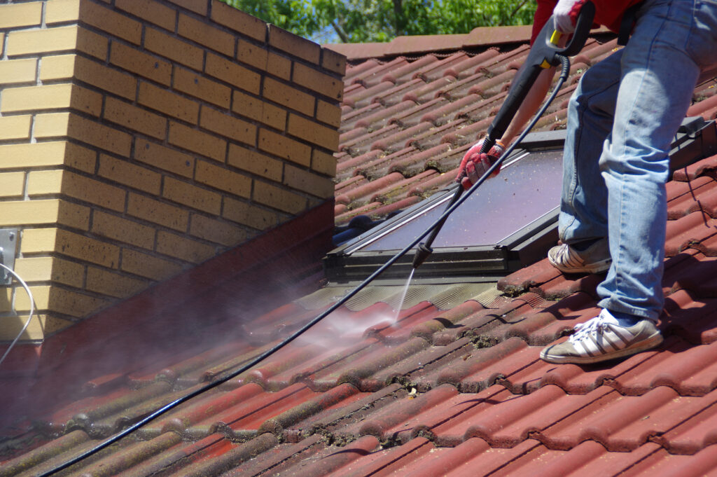 roof cleaning using water spray.
 